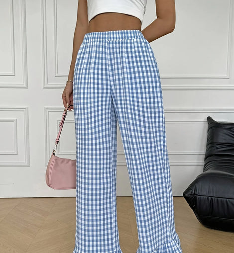 Women’s fashion: versatile checkered, ruffled, straight-leg pants that add a touch of freshness and youthful appeal.